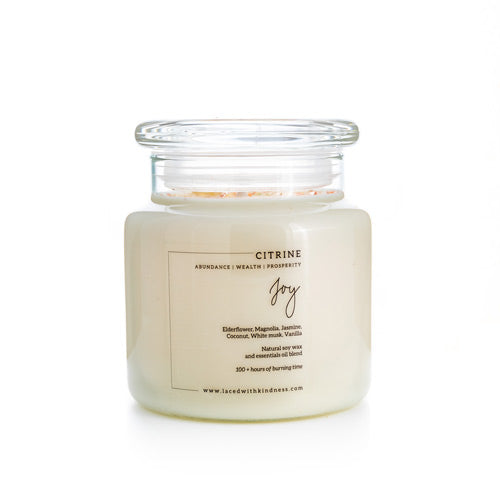 Candle Crystal Homewares Joy Citrine. Scent is Elderfloewr, Magnolia, Jasmine, Coconut, White musk, Vanilla