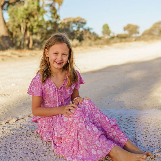 Little girl in Sandi midi pink loose-fitting boho dress for little girls