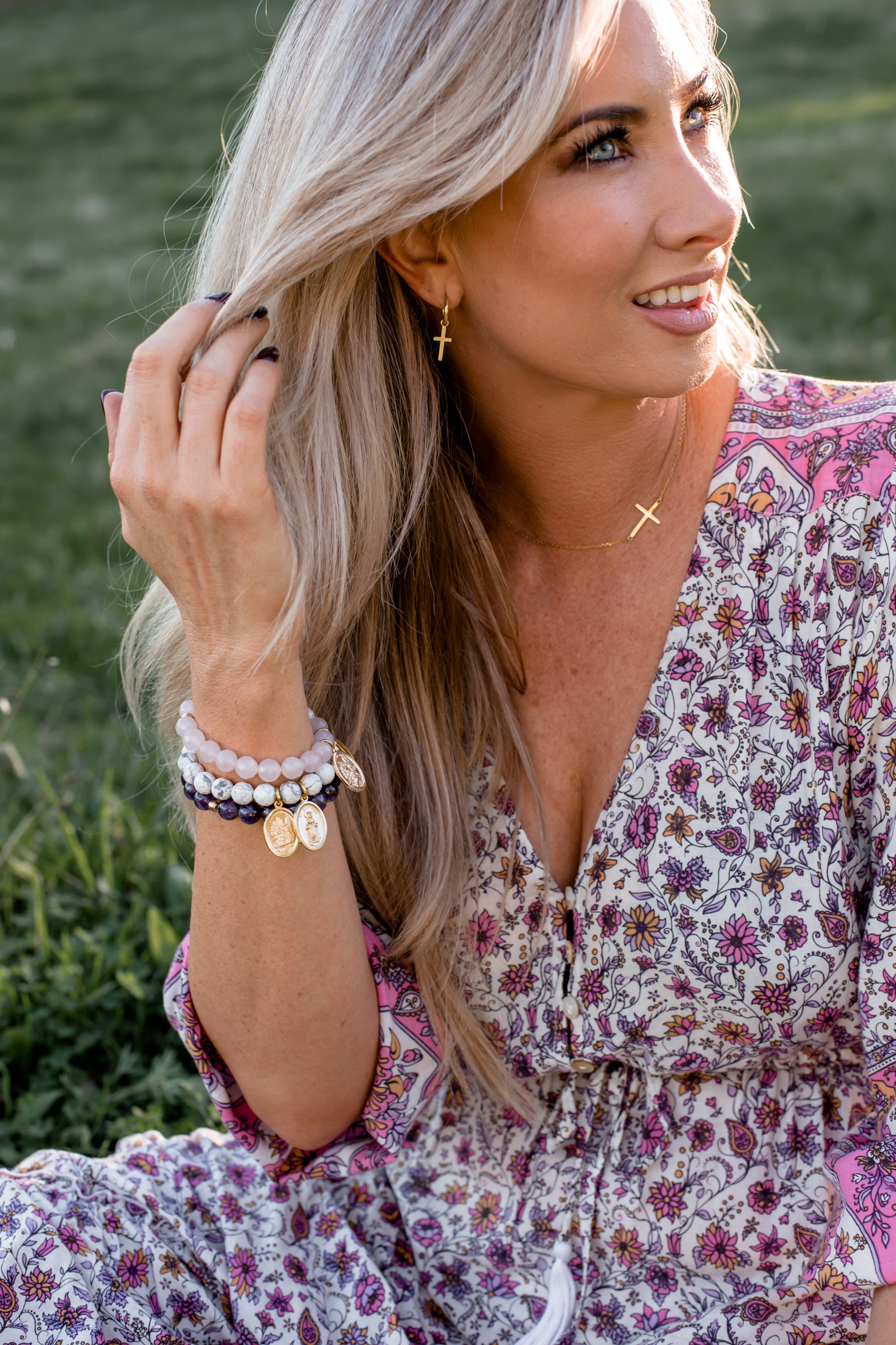 Model wearing crystal bracelet in Rose Quartz, White Howlite, and Amethyst