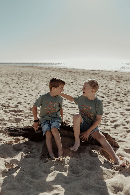 two boys at the beach wearing the I get by with a little help from my friends in SAGE color kids size
