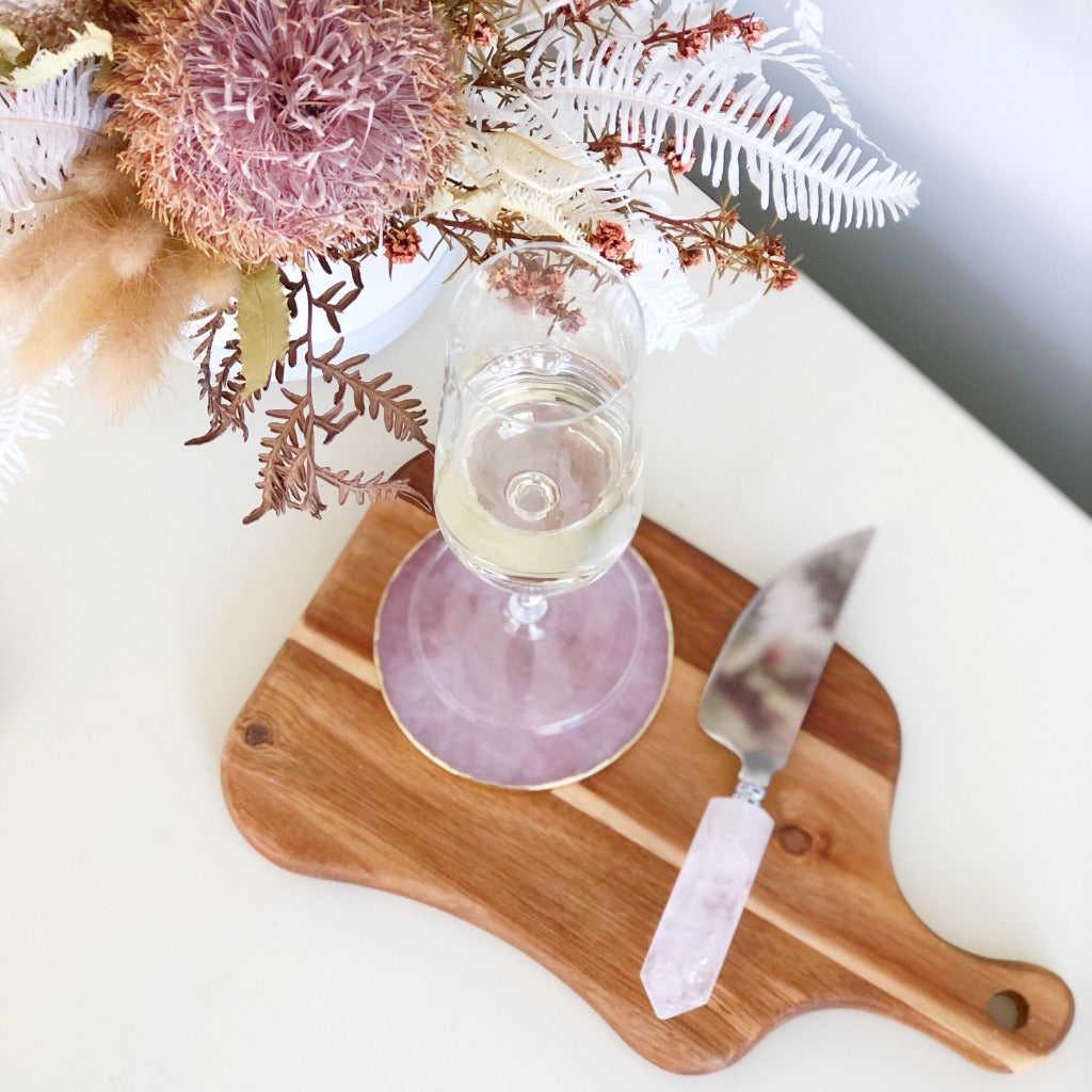 Wine glass on rose quartz crystal coaster, rose quartz  cheese knife