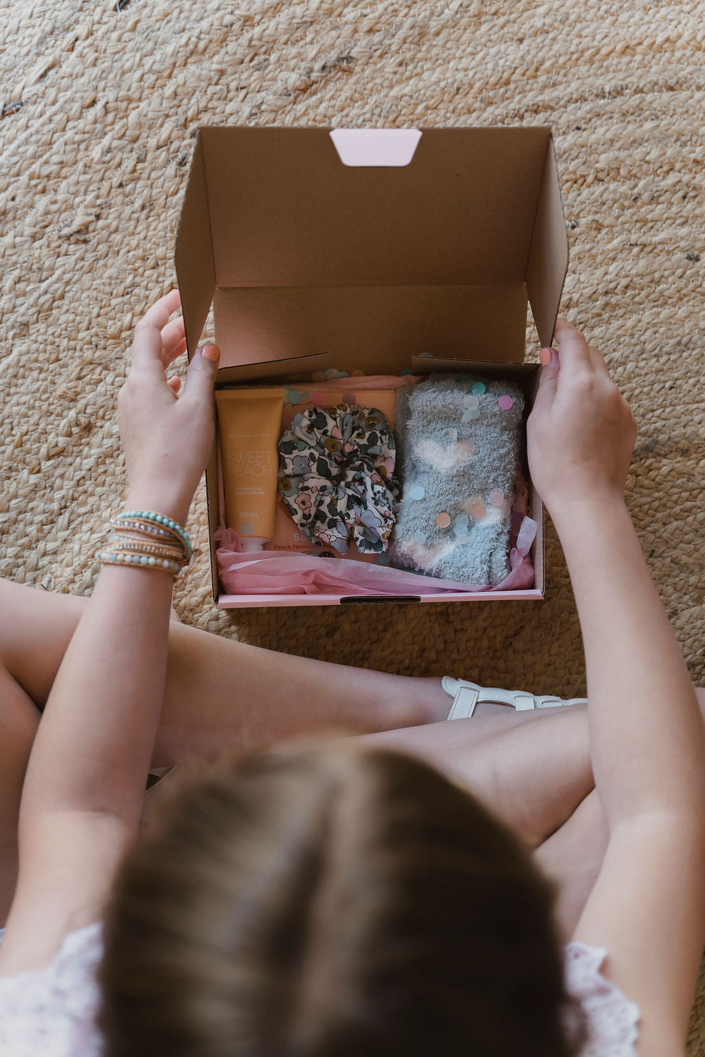 Tween Self care box , laced with kindness, hand cream, scrunchie, gratitude pad, socks, sour candy, penself care box, australian boho shop, for tweens