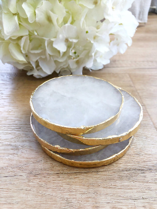clear quartz with a luxe gold trim in  wooden table with flowers