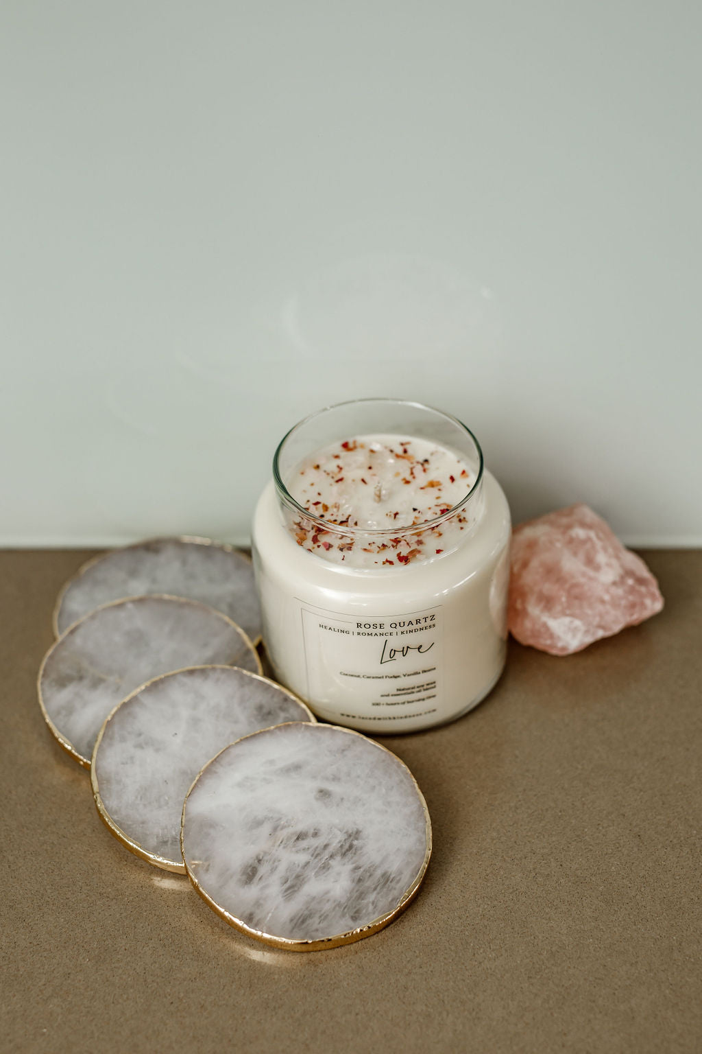 Candle Crystal Homewares Love Rose Quartz. Scent is Coconut, Caramel Fudge, Vanilla Bean. Candle is Glass, with crystal and four crystal coasters